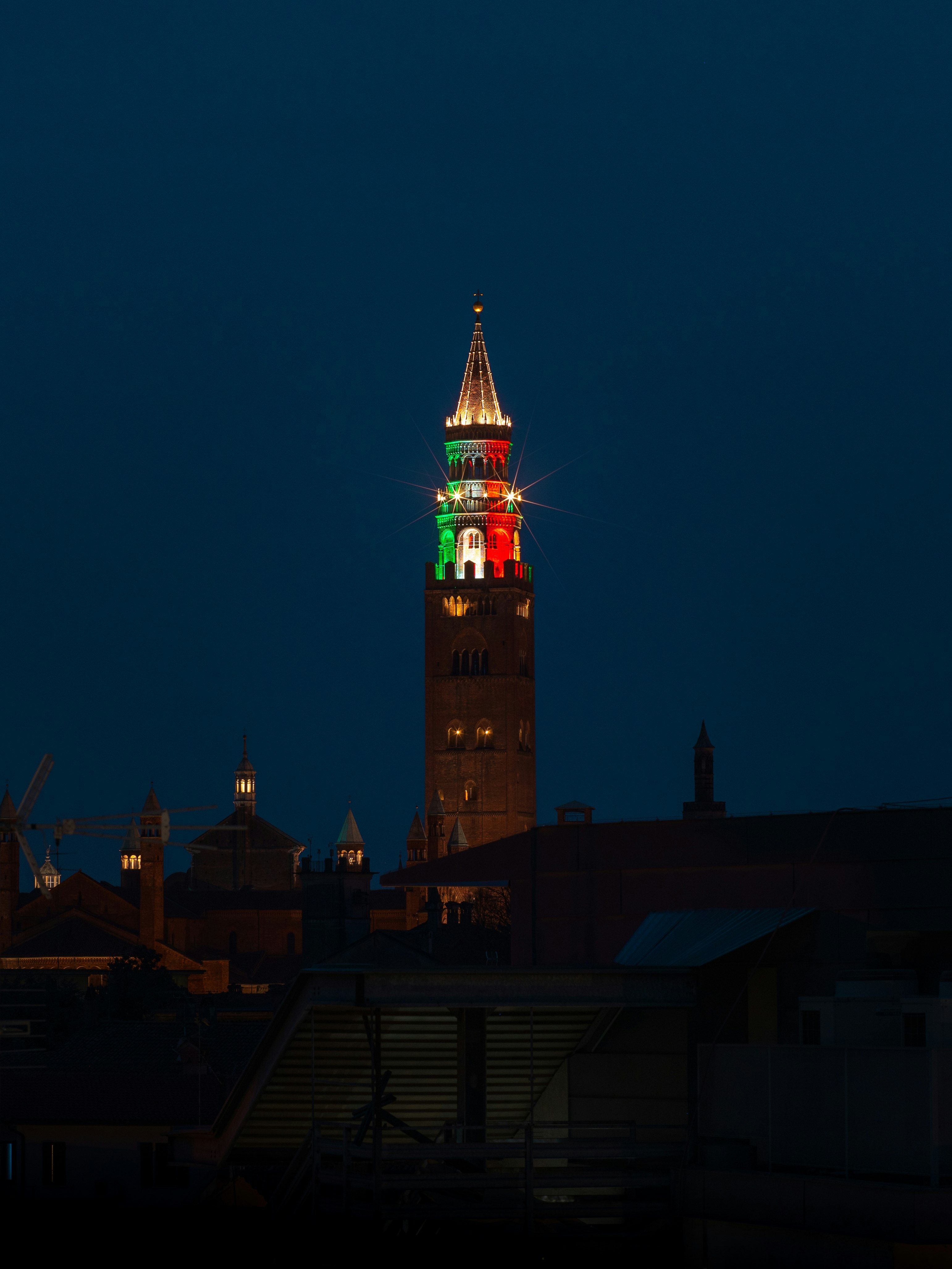 brown and red tower during night time